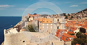 4K Footage Aerial View to the Old City Fortification and Red Roofs in Dubrovnik