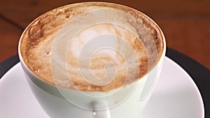 4k footage of a coffee spinning around