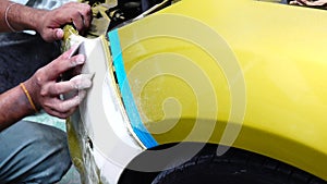 4K Garage Car body work car auto car repair car paint after the accident during the spraying automotive.