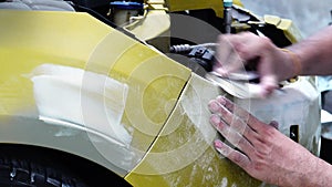 4K Garage Car body work car auto car repair car paint after the accident during the spraying automotive.