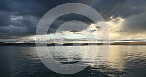 4k huge clouds mass rolling over lake namtso in morning,tibet mansarovar.