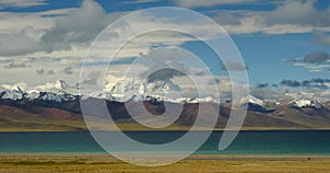 4k huge clouds mass rolling over lake namtso & snow mountain in tibet.