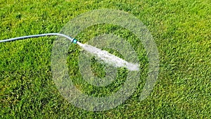 4K lawn sprinkler in a sunny day