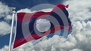 4k looping flag of laos waving in wind,timelapse rolling clouds background.