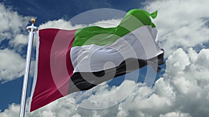 4k looping flag of UAE waving in wind,timelapse rolling clouds background.