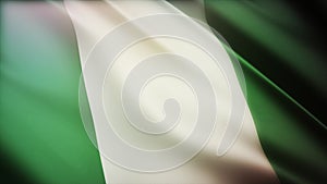 4k Nigeria National flag wrinkles wind in Nigerian seamless loop background.