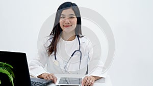 4K. online doctor consulting. Asian doctor talking directly to the camera for consulting online patient via video call