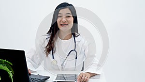 4K. online medical consultation. Asian doctor talking directly to the camera for consulting online patient via video call