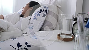 4k Panning camera of young sickness woman sleep