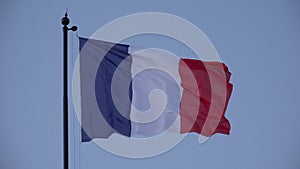 4K Paris, France Flag in Sunset, French Banner Waving in Dawn on a Blue Sky
