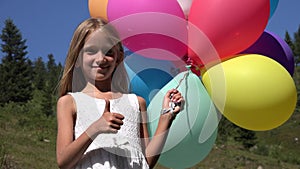4K Portrait of Child with Balloons Shows Thumb Up, Girl Playing Outdoor in Park