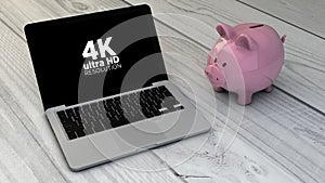 4k resolution screen and piggybank