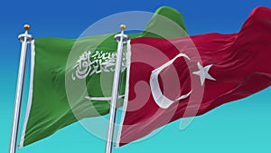 4k Seamless Turkey and Saudi Arabia Flags with blue sky background.