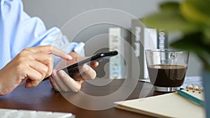 4k. side view of young woman using mobile smart phone surfing social media, checking news, reading text message, using smartphone