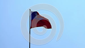 4K, Taiwanese flag waving in the wind at Taipei internatinal airport.