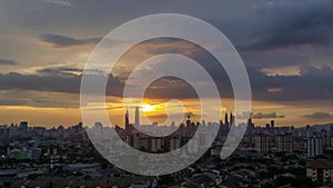 4K Time lapse cloudy and haze sunset over downtown Kuala Lumpur