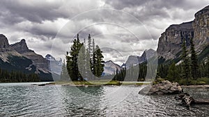 4K Time lapse film video movie Timelapse Clouds Moving Over Spirit Island in Maligne Lake in Jasper Nationalpark Alberta