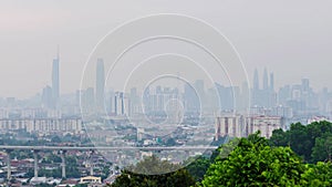 4k Time lapse of Kuala lumpur city center klcc with many highrise building skyscrapers in financial distict center area with snog