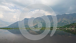 4K Time lapse of moving clouds over Dal Lake in Kashmir, India.
