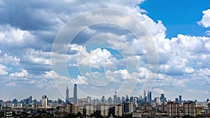 4K Time lapse of moving clouds over down town Kuala Lumpur