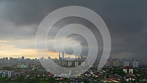 4K Time lapse of moving clouds over down town Kuala Lumpur