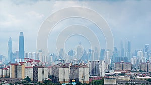 4K Time lapse of moving clouds over down town Kuala Lumpur