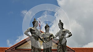 4K Time-lapse, Three Kings Monument is a sculpture symbol of Chiang Mai, Thailand with a motion white cloud in the background