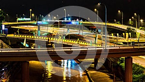 4K Time-lapse of traffic on freeway interchange at night in Kuala Lumpur Malaysia. 4K timelapse