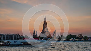 4K Time lapse of Wat Arun Ratchawararam the Temple of Dawn at sunset, one of the famous places in Bangkok, Thailand