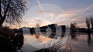 4k timelapse as dawn breaks over Castle Waterside and Marina in Nottingham