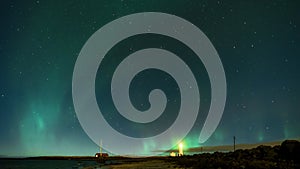 4k Timelapse movie film clip of Northern lights above the Grotta lighthouse, Reykjavik, Iceland