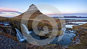 4K Timelapse of sunrise over kirkjufellsfoss waterfall and Kirkjufell mountain, Iceland