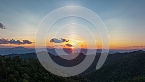 4K Timelapse of sunset with sun dog over the mountain