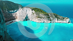 4k Timelapse of the world famous Navagio beach, Zakynthos, Greece. Turquoise sea water rolled to white sand beach with