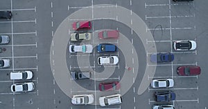 4k top aerial view of carpark with lots vacant space places traffic diagram.