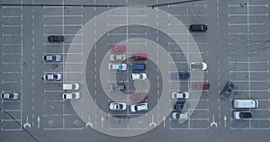 4k top aerial view of carpark with lots vacant space places traffic diagram.