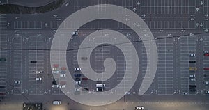 4k top aerial view of carpark with lots vacant space places traffic diagram.