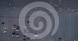 4k top aerial view of carpark with lots vacant space places traffic diagram.