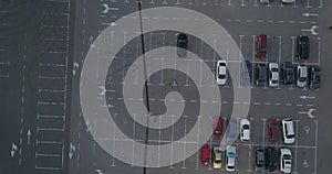 4k top aerial view of carpark with lots vacant space places traffic diagram.