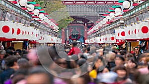 4K UHD time lapse of Asakusa sensoji gate, tourist crowd walking entrance to temple. Tokyo tourist attraction, Japan tourism, or A