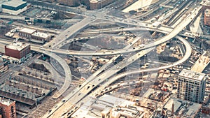 4K UHD top view time-lapse of car traffic on highway road intersection in Chicago, USA. Transportation or city life concept