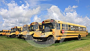 4K UltraHD Timelapse of waiting parked school buses