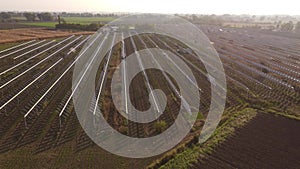 4k video aerial drone footage of solar panels in a field in Italy