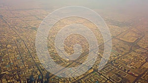 4K video of aerial view of suburban houses in city in desert, Dubai, UAE.