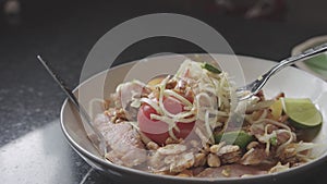 4k video, Authentic Thai Cuisine, Som Tam, papaya salad with Sweet and Sour Sauce Freshly Made.