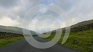 4k video driving along a narrow lane in a rural area of the Lake District, Cumbria