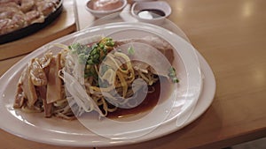 4k video, japanese cold ramen noodle on plate. Cold and delicious soup and cold noodles.