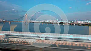 4K Views the bridge Seoul city and famous Han River from the train window