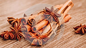 4k zoom in out Cinnamon and star anise on wooden background, Herbs and Spices over wooden background