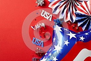 4th of July, Happy Independence day concept. Flat lay composition with American balloon, paper fans, signs USA on red background